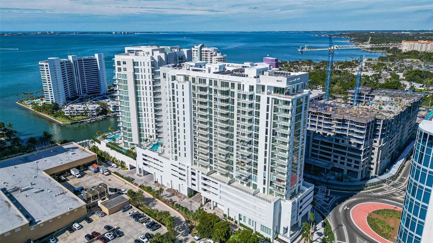 BAYSO...DOWNTOWN SARASOTA located at the Sarasota Quay. LUXURY living at it's finest. Be the first to occupy this newly completed premier condominium with split floor plan, 2 bedrooms + a den with custom built barn door, 3 full bathrooms all En-suite. Remote controlled blinds throughout. State of the art kitchen with all stainless, top of the line appliances. Quartz countertops with a large breakfast bar, European inspired cabinets. Inside laundry room with full size washer, dryer & wash tub. Open floor plan with floor to ceiling windows, 10' ceilings, sliding doors to a large balcony facing south with a partial view of the Sarasota Bay. Upscale amenities feature a heated pool & spa, fitness and movement center, splash lounge with a catering kitchen for entertaining and a covered pergola with a grilling station. This property comes with an assigned parking space, a storage unit and bicycle storage. Enjoy all that Downtown Sarasota has to offer, casual & fine dining, boutique shopping, renowned theatre district. short drive or bike ride to LIDO BEACH & St. Armands Circle.