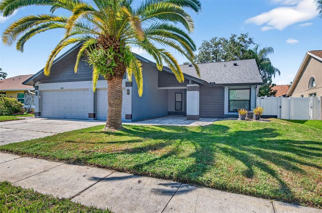 Photo of 12025 Steppingstone Boulevard, Tampa, FL 33635 (MLS # TB8430525)