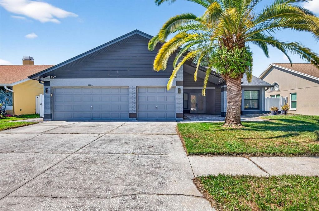 Photo of 12025 Steppingstone Boulevard, Tampa, FL 33635 (MLS # TB8430525)