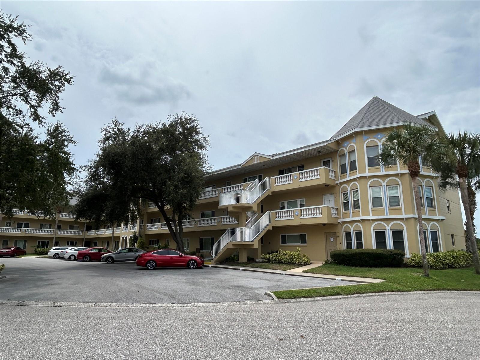 What a view! With its prime location overlooking Harbor Lake, this third floor Grande, with 2 large bedrooms and 2.5 bathrooms, boasts vaulted ceilings and updated windows. Both bedrooms have private ensuite bathrooms and huge walk in closets. You will enjoy the convenience of the full size washer and vented dryer in the built in laundry room, and the AC was replaced in 2023. Located in a vibrant 55+ community, you’ll have access to a wide range of amenities designed to enhance your lifestyle. Enjoy two private golf courses (9 and 18 holes), two heated swimming pools, and two activity centers. Stay active in the remodeled cardio gym or engage in various community activities like fitness classes, dancing, clubs, cards, and billiards. Pet owners will love the pet-friendly environment, featuring a fenced dog park and covered seating areas. Residents can also enjoy hobby studios and a woodshop for creative pursuits. The on-site Good Karma Café offers convenient take & bake meals and snacks. Conveniently located near beaches, transportation, shopping, entertainment, and fine dining, this condo perfectly combines comfort with accessibility. Please note that all room sizes, floor plans, and square footage are approximate. This property is being transferred by a leasehold estate deed, and association approval is required. If financing, a 35% down payment is necessary. Don’t miss this fantastic opportunity to own a contemporary condo in a prime location, offering an exceptional lifestyle with easy access to a wealth of amenities. Schedule your showing today!