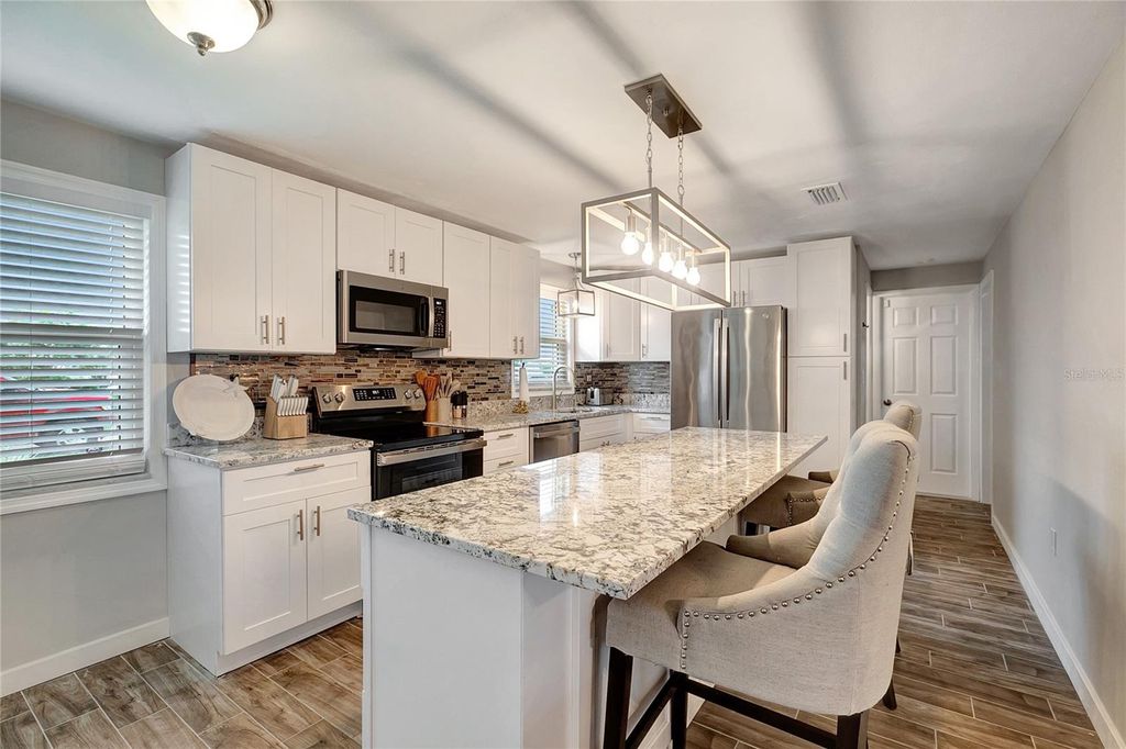 Photo of 242 176th Avenue E, Redington Shores, FL 33708 (MLS # OM722479)