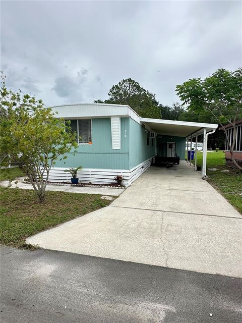 Photo of 818 Michigan Street, Wildwood, FL 34785 (MLS # OM725717)