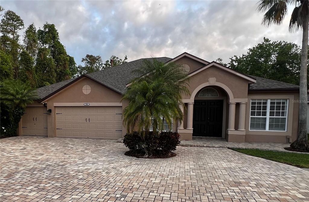 Photo of 7925 Calindra Court, Trinity, FL 34655 (MLS # J987371)