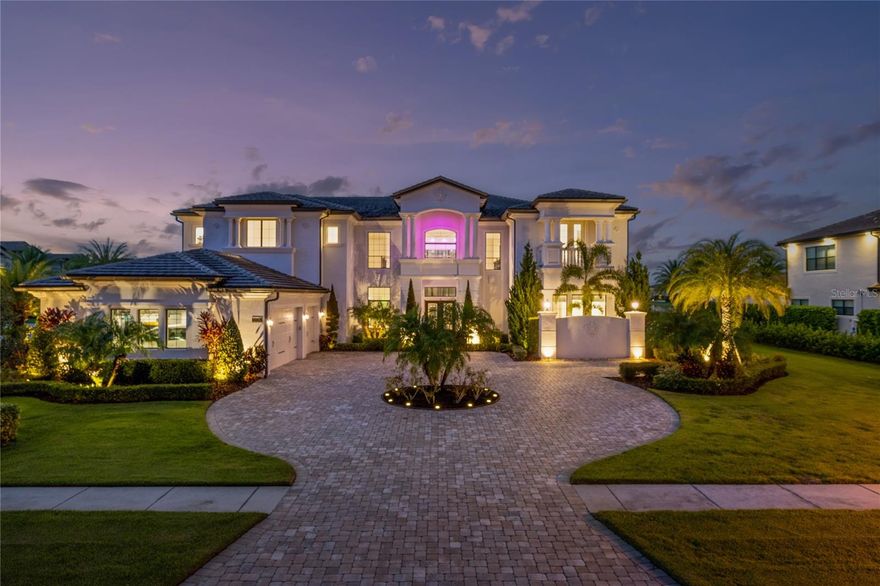 Welcome to Casabella! This stunning 6 bedroom home sits on large corner with waterviews from both the front and rear of the house. Casabella is a wonderful gated community in Windermere with easy access to all amenities including great schools, restaurants, shopping and all the Orlando attractions. The interior design in this immaculate home is impeccable. Plus the home has only been used for 2 months each year since it has been built. Once you enter this stunning home you are sure to be impressed by the great room with feature illuminated wall, 24ft ceiling with 2 storey window overlooking the spa, pool and pond. The room has a gorgeous wet bar complete with glass wine cabinet, perfect for entertaining and right beside the formal dining area. From there we go through to the open plan family room, dining area and kitchen. This kitchen has one of the most impressive islands you will ever see and is complete with high end stainless steel appliances and Sub Zero fridge. The master suite is also on the first floor overloooking the pool and pond. It not only has a stunning bathroom buit also it's own work out room. Completing the first floor is one more ensuite bedroom, a den/office and laundry. On the second floor we have a second master with balcony with beautiful views over the pool and pond with feature fountain. Completing the second floor are three more bedrooms, all with ensuite bathrooms and the large bonus room which would be perfect for a movie theatre or games room. Then we go outside to the oasis that is the back yard, in an instant you will come to appreciate how special this lot is as it truly massive with a 50ft pool with oversized spa at its center surrounded by mutiple entertaining spaces such at the under cover grill area, fire pit and incredible lawn area which wraps around the pool. Plenty of room for family parties. The finishes both inside and out really need to be seen to be appreciated. The 3 car garage and circular driveway with lots of room for parking finish off this spectacular property.