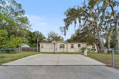 Photo of 12464 Lantana Avenue, New Port Richey, FL 34654 (MLS # TB8529813)