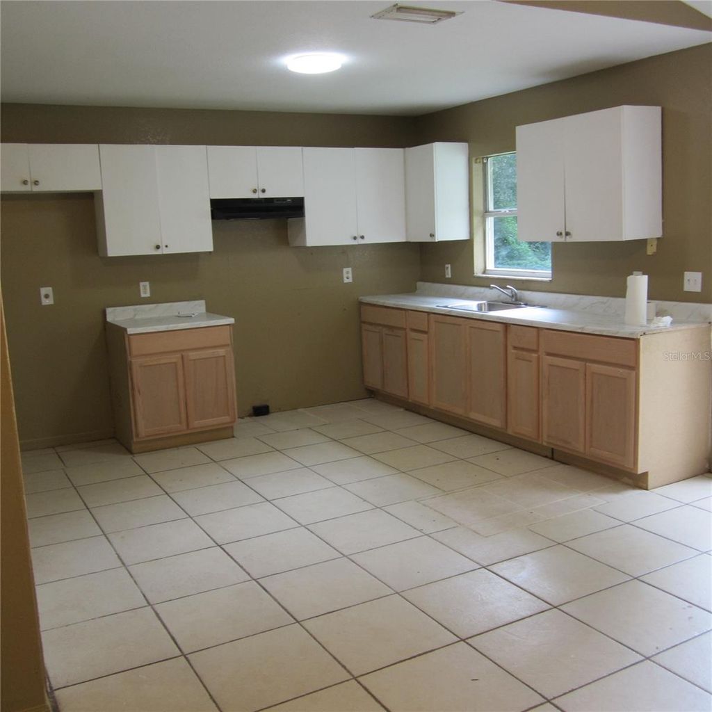 Photo of 1414 26th Street NW, Winter Haven, FL 33881 (MLS # O6338922)