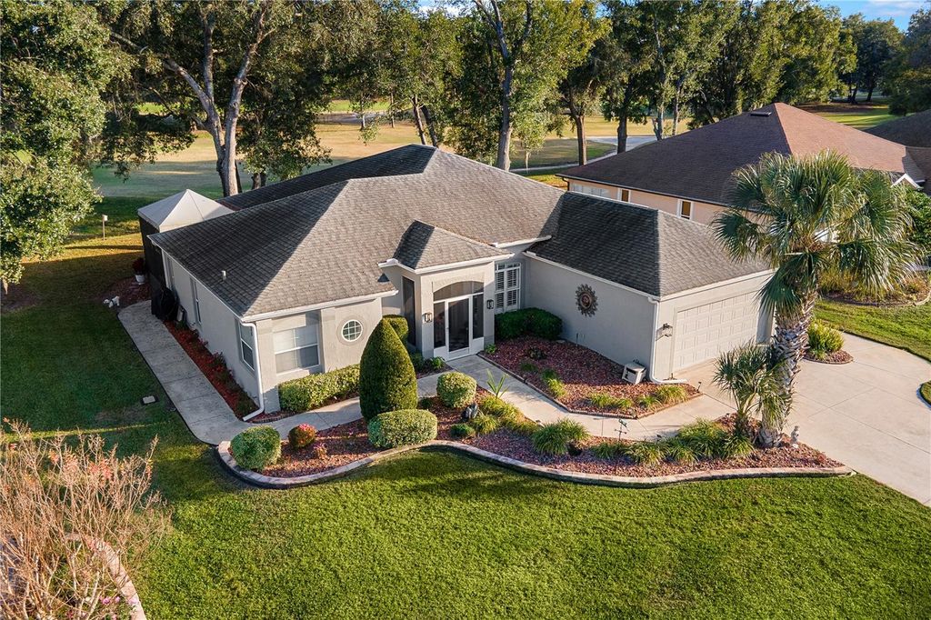 Photo of 5355 Grove Manor, Lady Lake, FL 32159 (MLS # G5106290)