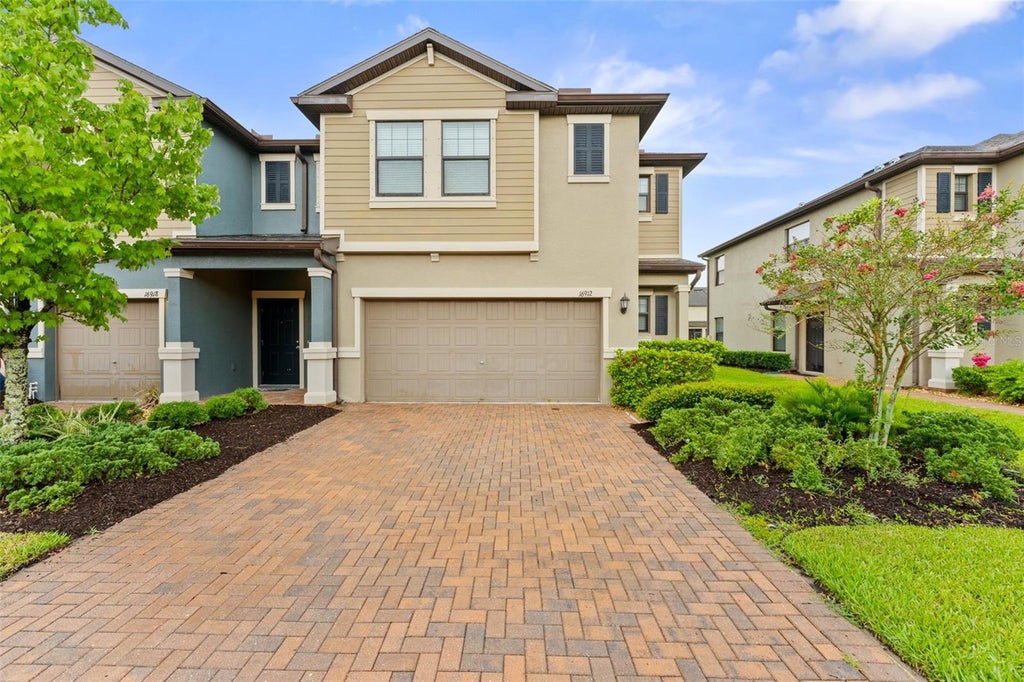 Photo of 16912 Red Brick Lane, Land O Lakes, FL 34638 (MLS # TB8525623)