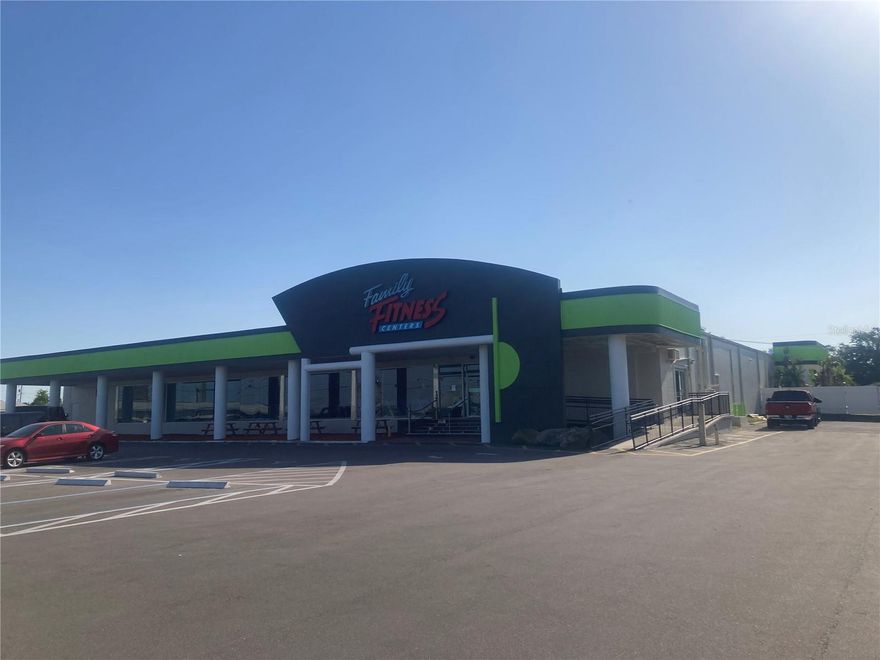 INCREDIBLE OPPORTUNITY!  The chance to own PRIME real estate along US 19 in the CITY OF NEW PORT RICHEY..  Property being sold with JOINING adjacent lot, totaling almost 4.5 ACRES!!  Building is currently occupied by a fully operating FITNESS CENTER.. Adjacent lot is VACANT with an incredible INDUSTRIAL size SWIMMING POOL already in place!  BUILDING provides over 30,000 square feet! OVER 15 PALLETS of GRANITE throughout!!  Multiple rooms that are being used as offices, classroom areas, physical therapy room, locker rooms and MUCH MUCH more..  ALSO, entire parking lot just recently Redone to meet city code..  This property is MASSIVE and a MUST SEE! Schedule your appointment today..  Please do not disturb the tenant..