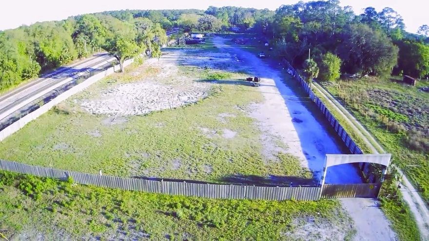 Welcome to a wonderful opportunity — Owner Financing Available, or You Can Buy. Development opportunity (industrial, commercial, or other uses). The property has been completely cleared, is elevated, and remains dry. The seller has removed all structures that previously existed across the various lots; consequently, the buyer may be eligible to receive impact fee credits from Volusia County (DeLand). This property comprises several distinct parcels. The site consists of 4.74 acres—totaling 206,745 square feet—and boasts a superb location within an area currently experiencing significant development, growth, and expansion. The location is perfect for any type of business, situated right next to the Orlando SUNRAIL station in DeLand, Florida (https://www.discoverdeland.org)—a city that has been voted and acclaimed as a charming, welcoming, and family-friendly small town within the Central Florida region. There is easy access to Stetson University, an institution with a strong focus on athletics that fields teams in football, baseball, basketball, and other sports. If you enjoy nature and the pleasure of crystal-clear river waters, you are just minutes away from De Leon Springs, Blue Spring, and the St. Johns River. The SUNRAIL system connects you to all of Central Florida—including Orlando and Kissimmee—and will soon extend to the Tampa area. This property features access to municipal water and sewer services.