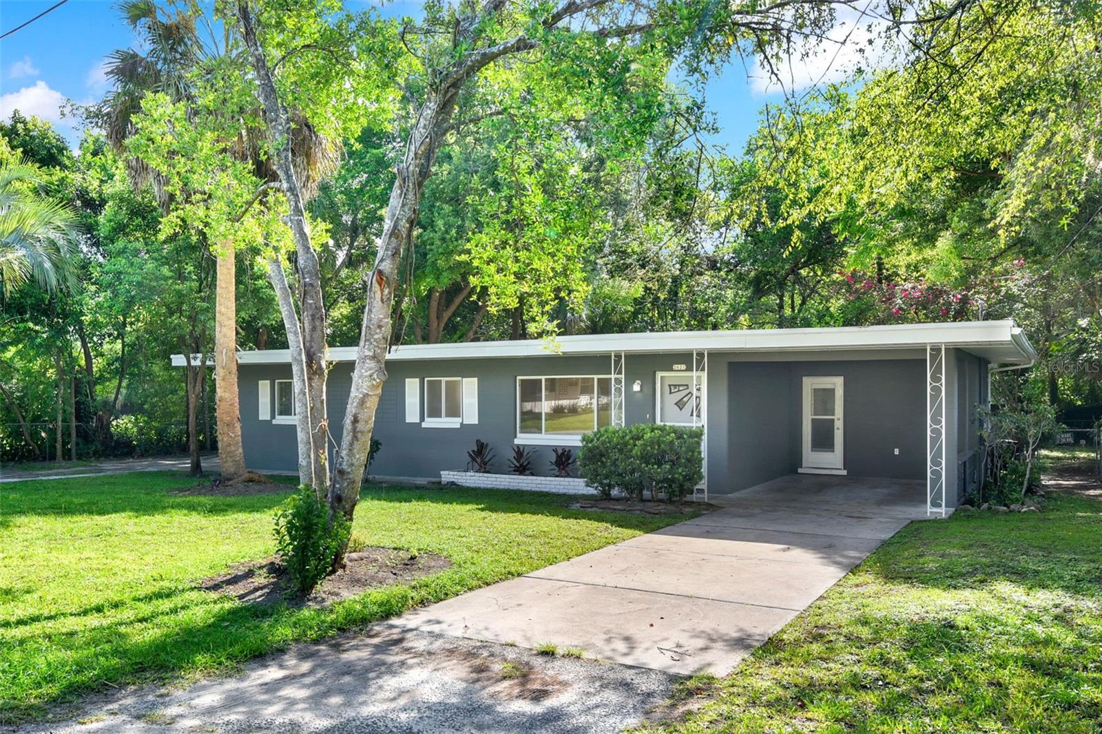 Amazing opportunity to own this affordable, remodeled, home with no HOA! Located just 4 miles to the College of Central Florida Campus, Paddock Mall & Shoppes at Paddock Park where you'll have an abundance of choices for shopping, dining, banking, & entertainment. 10 minutes to I-75 for easy commute to anywhere! Love camping? The Ocala National Forest is close by, and this home includes the perfect spot to park your RV! No more storage fees! This home was original built by a contractor for himself, and since, has only had 1 additional owner! Renovated from the floor up with upgrades that include the following: Roof in 2019, Water Heater in 2024, luxury vinyl throughout including new 6 inch baseboards, new kitchen countertops, new backsplash, stainless steel appliances, new light fixtures, new paint inside & out, remodeled bathroom, new gutters, and new ceiling fans & light fixtures! The kitchen cabinets are solid wood and built to last! The quarter acre lot is fully fenced in the back, allowing pets and/or children to play safely with peace of mind. The Florida room is surrounded by windows and overlooks the peaceful scenery that you'll call your back yard. This home also includes 3 skylights throughout, giving plenty of natural light and offering savings on your electric bill! The septic tank has just been pumped. This could be the best valued move-in ready home in all of Ocala! Come check it out before it's too late!