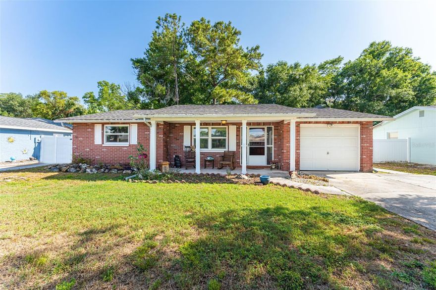 This charming 2 bedroom, 2 bathroom home is located on a quiet street in New Port Richey.  New flooring and new refrigerator.  Both bedrooms are spacious with plenty of closet space and there is a bonus room off the kitchen.  There is a large screened in porch looking out to the tree covered backyard.  Washer / Dryer available.  No pets and no smoking please.