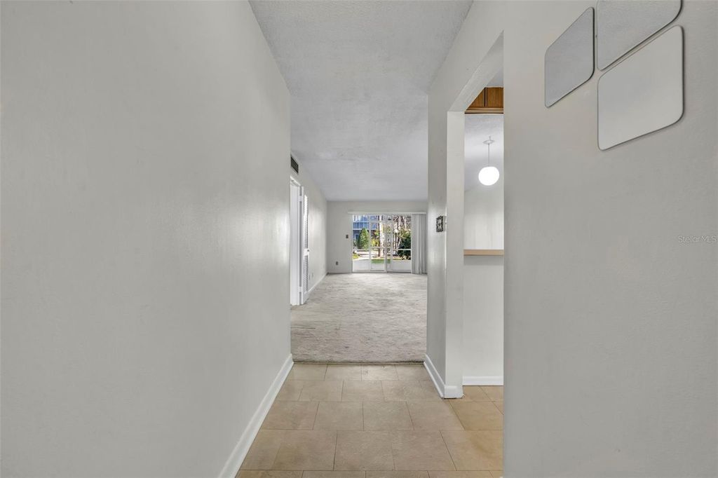 Photo of 1250 S Denning Drive #104, Winter Park, FL 32789 (MLS # O6371777)