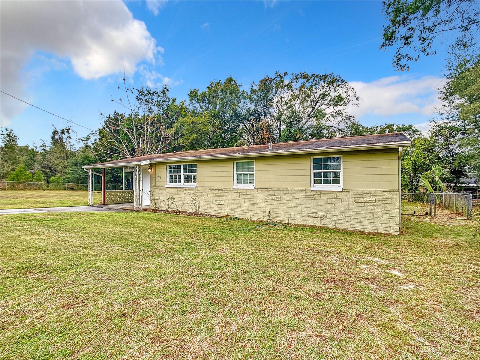 Secure a prime piece of real estate just 4 miles from the World Equestrian Center. Property is fenced in on an oversized lot. Huge bonus living area with a stone fireplace, open kitchen, storage room, shade trees.