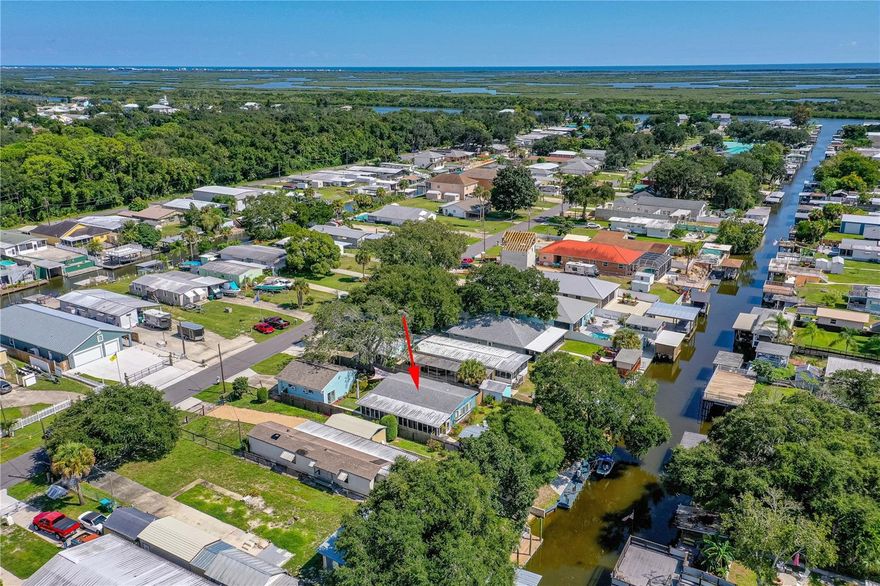 **REDUCED** WHO SAID YOU CAN’T HAVE IT ALL? THIS PROPERTY HAS JUST ABOUT EVERYTHING YOU COULD WANT IN A WATERFRONT HOME ON THE WORLD-FAMOUS MOSQUITO LAGOON. THE HOME IS ABSOLUTELY BEAUTIFUL AND SITUATED ON THE WATER IN A FISHING PARADISE. NO ATTENTION SPARED ON THE DETAILS AND UPGRADES THAT MAKE THIS ONE STUNNING PROPERTY. ONCE YOU STEP INSIDE THIS WELL-APPOINTED HOME YOU WILL NOTICE THE WATER AND BACKYARD VIEWS. FROM THE UPDATED KITCHEN, BATHROOMS, CEILING FANS, AND COZY BAY WINDOWS YOU WILL FEEL THE ELEGANCE OF LIVING IN PARADISE. AND... THATS NOT ALL. NOT ONLY DO YOU HAVE A BEAUTIFUL HOME WITH A GREAT FLOOR PLAN YOU HAVE A SEPARAGE GARAGE/WORKSHOP. THE OVERSIZED  2-CAR GARAGE HAS A WORKSHOP, OFFICE/DEN 10FT CELINGS, RAFTER STORAGE AND LAUNDRY ROOM. THE PRIVACY FENCED IN BACKYARD HAS ALMOST TOO MANY AMENITIES TO LIST. THE 50' DOCK HAS TWO BOAT LIFTS WITH DAVITS, WATER & ELECTRIC, AND A FISH CLEANING STATION, MANY CREATIVE AND UNIQUE ITEMS AS WELL AS A TIKI BAR AND EXTENSIVE DECKING MAKE THIS A FAMILY DESTINATION. GREAT PROPERTY FOR ENTERTAINING OR JUST ENJOYING THE TROPICAL PARADISE FEEL OF YOUR NEW HOME. THERE ARE NO HOA DUES ON THIS PROPERTY. LOCATED IN THE LOWEST RISK FLOOD ZONE, ZONE X. JUST A MINUTE’S BOAT RIDE TO DISAPPEARING ISLAND, PONCE INLET, OR NEW SMYRNA BEACH. THIS ONE-OF-A-KIND PROPERTY IS CONVENIENT TO SHOPPING, RESTAURANTS, HOSPITALS, AIRPORTS AND JUST MINUTES TO THE OCEAN. ENJOY THE ROCKET LAUNCHES FROM CAPE CANAVERAL OR A SHORT DRIVE TO PORT CANAVERAL CRUISING SHIPS. MUST SEE TO APPRECIATE.