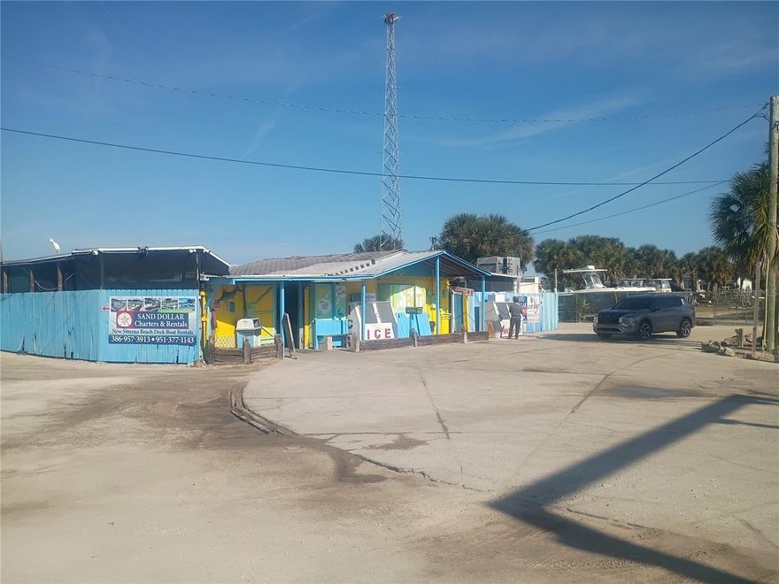 New Smyrna Beach Marina and Bait Shop Real Estate For Sale - 2 Waterfront parcels totaling .67 acres in size For Sale with 35+ floating boat docks (more floating docks can easily be installed with permits).   Zoning allows for Marina, Boat Rental, Restaurant/Bar, and other uses!  The current owner is operating a boat rental business and a bait shop that has been in business since 1973.  The current owner will lease back the property @ $10,000/month for 10 years (Possible to negotiate/buy out current owners businesses).  Seller Financing available with a $1M down payment.