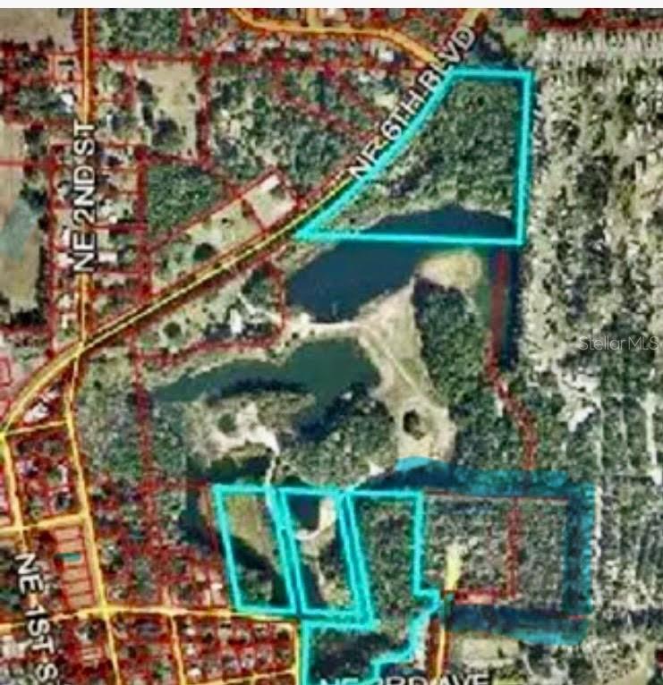 It’s hard to believe that the secret gem is located in the heart of downtown Williston! but at the turn of the century, it was a thriving rock quarry, thus the deep cliffs and the spring-fed bodies of water… great for a fishing and hunting. The serene park like setting consists of 32 acres. Street access on pave roads and utilities. Make it hey prime choice for an estate or development. Buy appointment only, no trespassing, please.