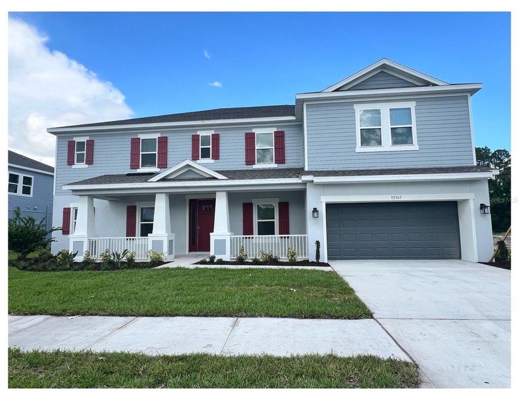 Photo of 33767 Landsman Loop, Wesley Chapel, FL 33543 (MLS # J977285)