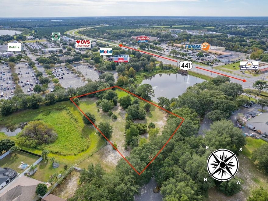 MIXED-USE VACANT COMMERCIAL LAND 
Gables Drive | Eustis, FL 32726
±1.58 Acres | Mixed-Use (MCR) Zoning
Positioned at the North Gateway to historic & Charming Downtown Mount Dora, this ±1.58-acre mixeduse parcel represents one of the last remaining ready-to-build vacant lots along the 
Highly sought-after US Highway 441 commercial corridor, near its intersection with 
Donnelly Street.
The property offers exceptional visibility and frontage along Highway 441, enhanced by 
serene pond frontage that creates a distinctive setting rarely found on major commercial 
corridors. The site is bordered by national retailers Lowe’s and Ace Hardware, with the 
established 44 Gables residential community to the rear, providing strong built-in 
demand and synergy for future development.
Located within the City of Eustis at its boundary with Mount Dora, the property is zoned 
MCR (Mixed-Use Commercial Residential), allowing a wide range of permitted uses 
including:
• Residential (all types)
• Live/Work concepts
• Medical and professional offices
• Retail and neighborhood commercial uses
• Child or adult care facilities
• Bed & Breakfast
• Select automotive service uses
The site is ideally suited for a mixed-use project combining commercial, office, and/or 
residential components to serve the surrounding high-growth area.
Key attributes include favorable access, efficient lot shape, ideal topography, and strong 
adjacencies supporting immediate development. Extensive due-diligence materials are 
already completed, including boundary and parcel maps, topographic survey, utility 
information, and a pre-approved drainage permit from the St. Johns River Water 
Management District.
Ownership has explored multiple development scenarios and may share conceptual plans 
and supporting documentation with qualified buyers.
A rare opportunity to acquire a strategically located, entitled mixed-use site in one of 
Lake County’s most active growth corridors