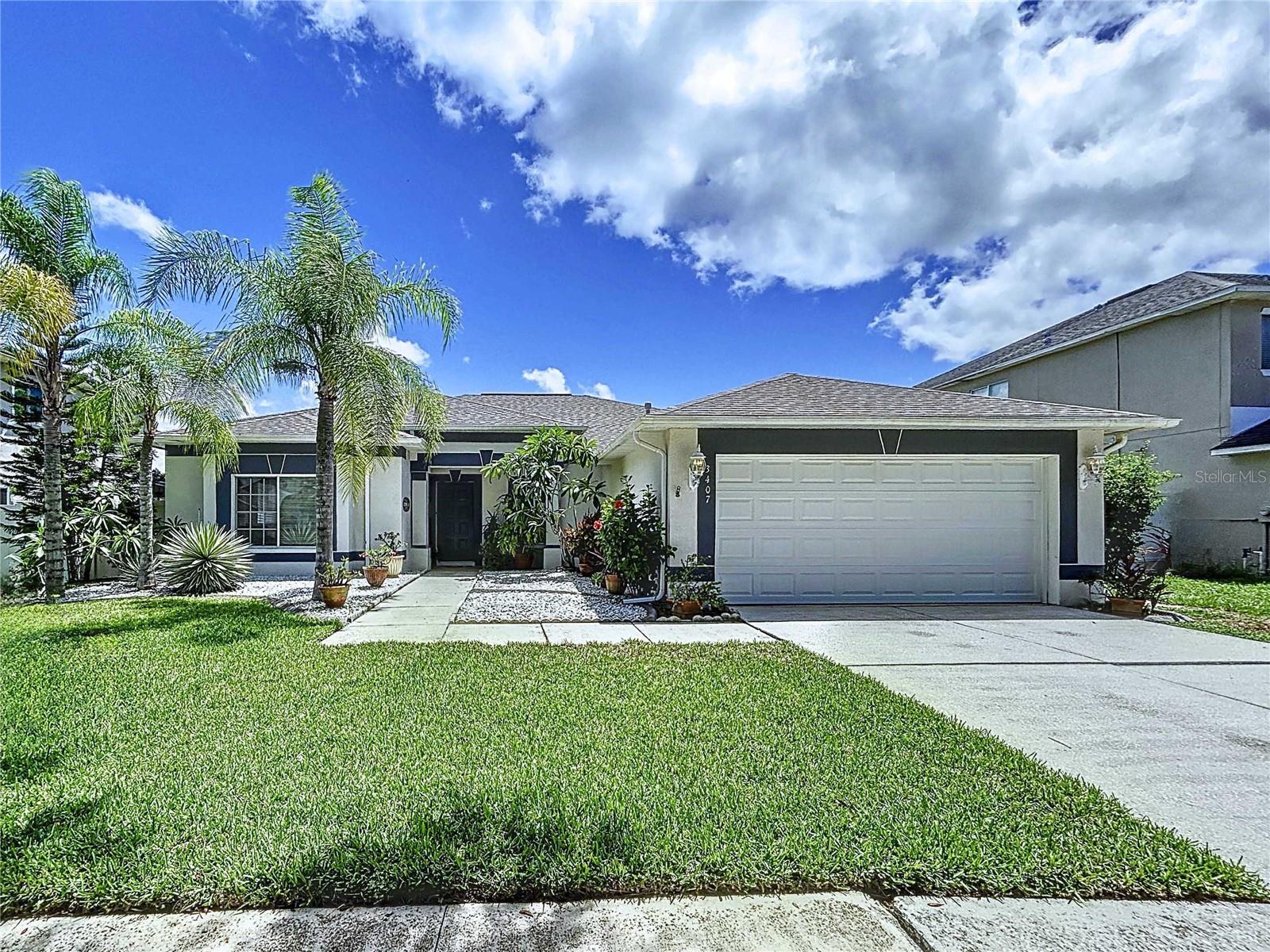 Turnkey 3-Bedroom Pool Community Home with Tropical Backyard Paradise!!! Welcome to this beautifully maintained 3-bedroom, 2-bathroom, 2,200 sq. ft. single-family home featuring a well-designed split-bedroom floor plan and thoughtful updates throughout.
Step through the front door to be greeted by gleaming porcelain floors and a spacious formal dining/living area that seamlessly flows into the open-concept kitchen and family room. The living room, primary suite, and 3rd bedroom boasts rich cherry hardwood floors, while the 2nd bedroom features brand-new luxury vinyl plank flooring. The large primary suite includes a remodeled en-suite bath with modern finishes and a generous walk-in closet. The open kitchen offers an abundance of cabinets, granite countertops, a cozy dining nook, and direct access to the outdoor living area through sliding glass doors. Enjoy Florida living year-round on the oversized, covered, and screened lanai, perfect for entertaining. The fenced backyard is a true tropical retreat with a peaceful fountain surrounded by mango, longan, lemon, papaya, sapodilla, and sugar apple trees. Recent updates include: Entire interior freshly painted (August 2025), brand-new roof (May 2025),
AC replaced 2022, and Water heater replaced in 2021. Located in a vibrant community with resort-style amenities including a pool, playground, dog park, and basketball courts. Ideally situated just off State Road 60, with quick access to major highways, shopping, dining, Brandon Hospital, entertainment, and Hard Rock Casino. Don’t miss the chance to own this move-in-ready home with modern upgrades and a private backyard paradise! Click to view VIDEO! https://youtu.be/2GtRb-Ei8wI