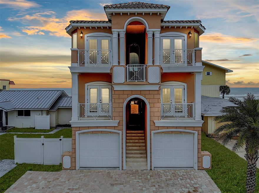 Glamourous, Mediterranean style home with beautiful balconies overlooking your own private beach. Fully furnished, 6 bedrooms, 5.5 bath, This 3-story home is packed with luxury from its exquisite architectural details to its infinity pool, spa, and hot tub, to its incredible panoramic oceanfront views from both the windows and the decks, plus a walkway directly to the beach. It also boasts a 3 stop elevator, sliding pocket doors on all levels, ocean front leisure room and entertainment area, laundry room, and ample parking with a single car garage plus 6 additional parking spaces. Along with a pool, there’s a bedroom and full bath on the first level. There’s also an outdoor oceanfront entertainment area with a fire pit and enough seating to accommodate a party. The second floor has 2 guest suites coupled with full baths, plus a gourmet kitchen with walk-in pantry, stainless steel appliances, custom cabinetry, granite counter tops and beautiful porcine tile flooring. The dining area features a large bay window with ocean views to the north and an expansive 25-foot covered observation deck directly outside. On the third level, you’ll find two additional guest bedrooms and bathrooms along with the master suite which features spectacular ocean views. The master bath impresses with its Moen fixtures, double granite vanities, jetted whirlpool tub, large tiled shower, and yet another expansive 25-foot covered oceanfront deck with amazing views. Then, of course, there are the benefits of the New Smyrna Beach itself with its extensive beaches and outdoor activities, culinary variety, downtown shopping areas, and so much more. This is the perfect property whether you’re looking for a beach house for yourself or an asset for investment purposes. It’s authorized for short-term rent and has a stellar rental history of three years of income vitality at over $230K in income per year! It can accommodate up to 16 people and enjoys the low tax rates. ;Water: City