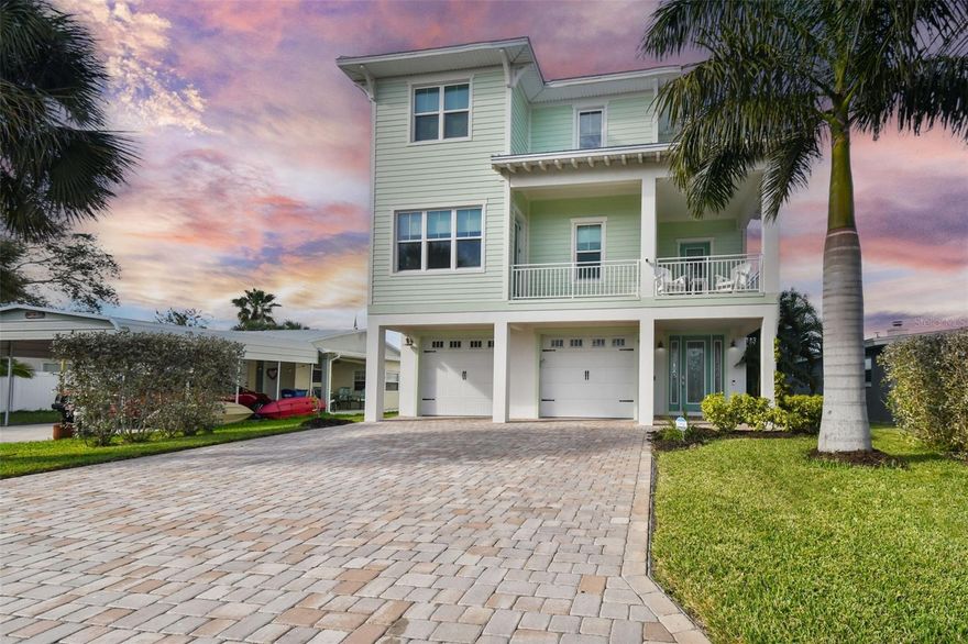 Don’t  miss this opportunity to own an industrial built quality home. All block and concrete construction. Low homeowners insurance. Tranquility awaits in this awe-inspiring, custom-built retreat. Breathtaking wide-open waterfront await in this Key West Style home. Masonry construction built (all floors) on piling system with concrete balconies. Complete with 24,000 LB capable boat lift and recently built dock. Featuring: Open floor plan, 9.4 ft coffered ceilings, gourmet kitchen with Viking gas cooktop, custom wood cabinetry, pantry, solid surface counters, beverage refrigerator, whole house water softener, and stainless steel appliances. Hardwood floors throughout. 12 Ft. Pocket slider for wide open view of Boca Ciega Bay. Guest bedroom suite with private bath and balcony on 2nd floor offers unparalleled privacy. Owners Suite on 3rd floor with private balcony and 2 large walk-in closets and direct elevator access to all floors. Crown molding and trimmed off windows and doors throughout. Wood ceilings in kitchen, dining room and living room. This beautiful home is FEMA complaint and able to withstand anything Mother Nature throws its way.  Complete with; energy efficient foam insulation, metal roof and 4+ car garage. Enjoy your own private heated pool, top of the line Clarity Spa and open covered outdoor living space. This one of a kind masterpiece is built by award winning Marc Anthony Builders. Superior features: hurricane windows, all block and concrete construction, concrete balconies, tankless hot water heater, 24,000 lb lift, hard wired security system, pre-wired for C2C smart home functionality, Hardi-Board concrete siding on top of block, and less than ½ mile stroll to the Gulf of Mexico and countless waterfront and boater dining choices. Rare super fast access to the Gulf of Mexico by boat. Only minutes to John’s Pass and open Gulf water boating. Bike/drive to downtown St. Pete for world class restaurants, museums, theater and music. It’s all in the details and this home has them all!