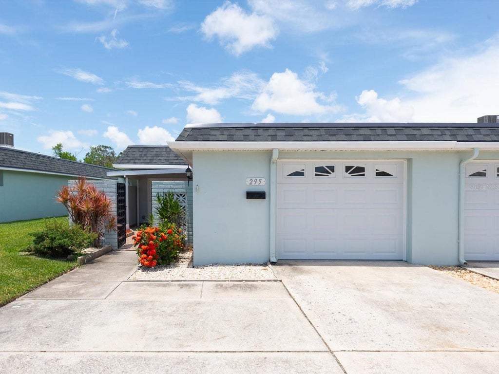 Photo of 295 Boca Ciega Point Boulevard N, St Petersburg, FL 33708 (MLS # TB8530801)
