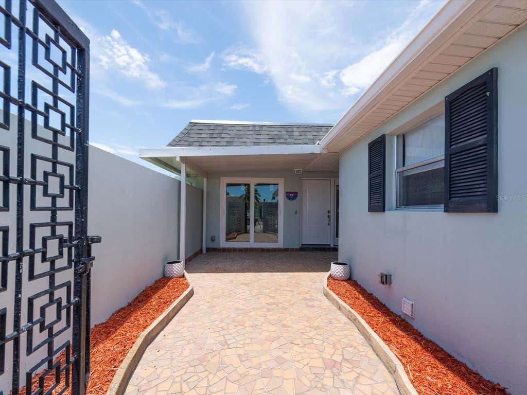 Photo of 295 Boca Ciega Point Boulevard N, St Petersburg, FL 33708 (MLS # TB8530801)
