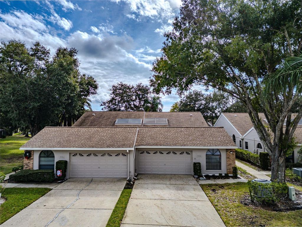 Photo of 5530 Salem Square Drive N, Palm Harbor, FL 34685 (MLS # TB8455364)