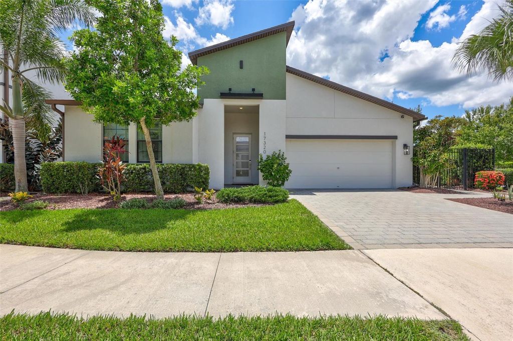 Photo of 17320 Boyscout Lane, Land O Lakes, FL 34638 (MLS # TB8411363)