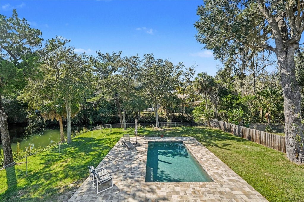 Photo of 6101 Avenue Of The Palms, Weeki Wachee, FL 34607 (MLS # TB8561226)