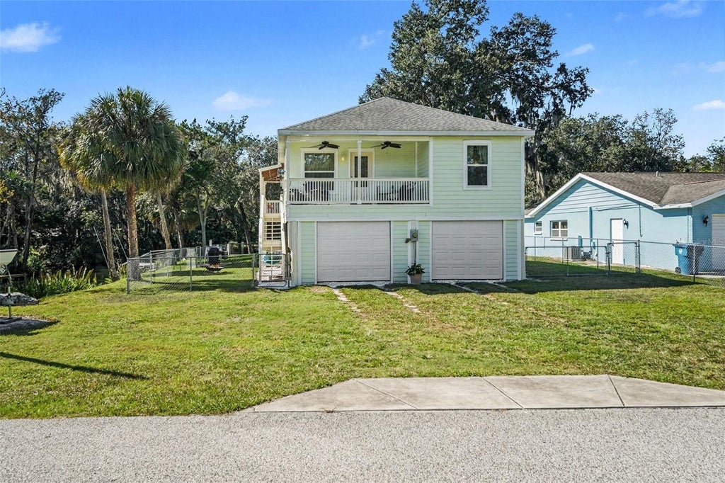 Photo of 6101 Avenue Of The Palms, Weeki Wachee, FL 34607 (MLS # TB8561226)