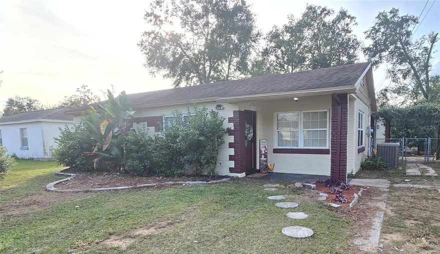 Location, charm, and opportunity meet in this 2-bedroom, 1-bath home just a short walk from beautiful, historic downtown Dade City. Enjoy easy access to local shops, restaurants, festivals, and community events, all while living in a quiet residential setting. This home offers great potential for buyers ready to add their personal touch. Major systems have already been updated within the last 10 years, including the roof, AC, and hot water heater—taking care of the big-ticket items. The fully fenced backyard features two storage sheds, a garden/pond area, and a covered back porch perfect for relaxing or entertaining. With minutes-away shopping and dining, plus the charm of downtown right outside your door, this property is an excellent opportunity for homeowners or investors alike.