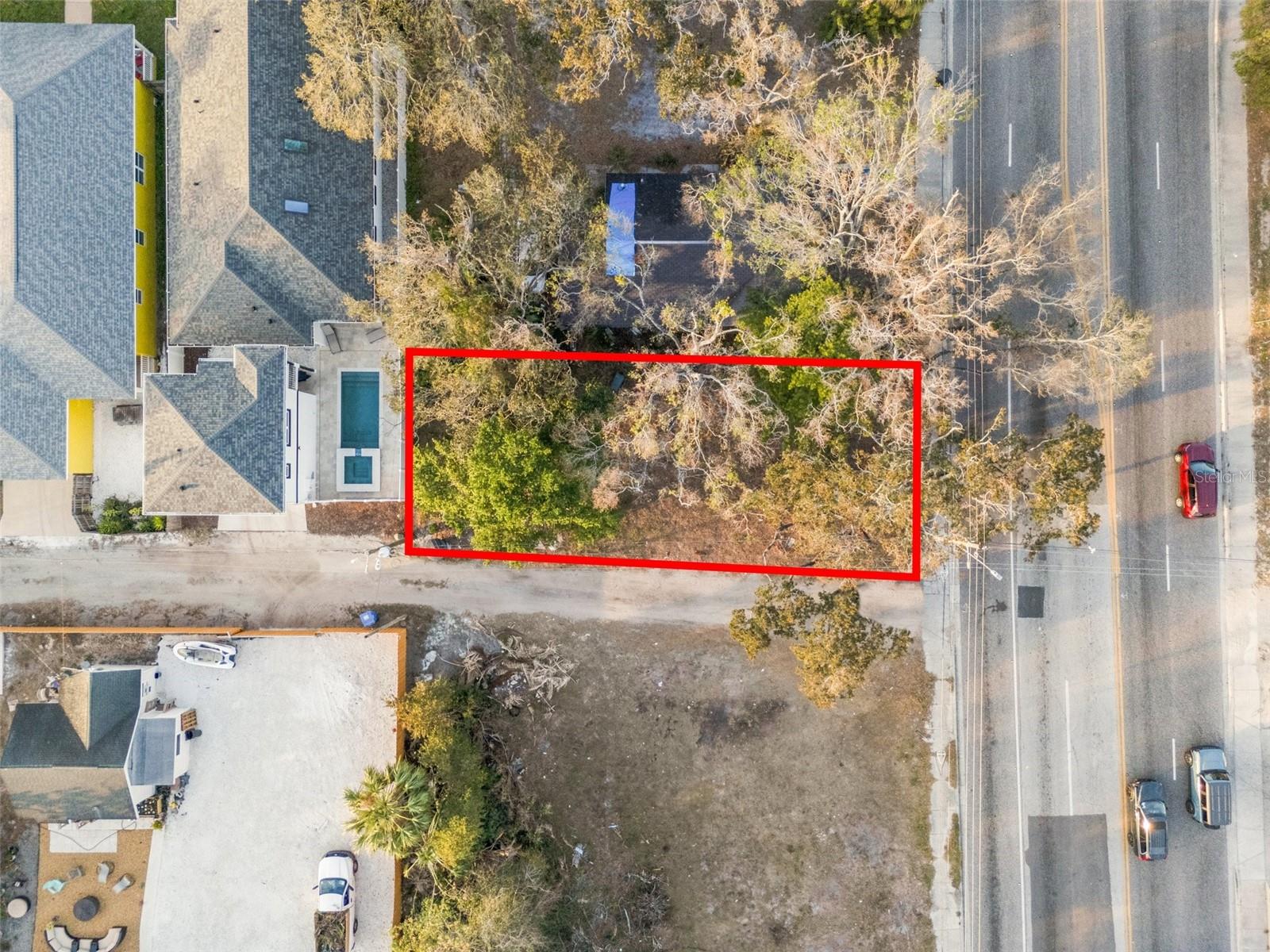 Nestled in one of the most sought-after neighborhoods in St Petersburg! This vacant lot offers an unparalleled opportunity just steps from Central Avenue and with convenience of walkable access to an array of boutique shops, top-rated restaurants - Pete's Bagels, Urban Stillhouse, lively bars, and cultural attractions that define this thriving area. Ideally positioned between the Historic Kenwood District, Grand Central District, and the Arts Warehouse District, this property places you at the center of St. Pete’s most vibrant and rapidly growing neighborhoods. This lot comes with pre-approved construction plans for a charming 3-bedroom, 2-bathroom, 1,200 sq. ft. home with a parking pad—a significant advantage that streamlines the building process. All plans have been paid for and fully approved for permitting, allowing you to start your project immediately. Zoned NTM-1, this property offers flexibility for either a single-family home or multi-family residential units, making it a prime investment opportunity. With new developments continuously transforming the surrounding area, this lot is perfectly positioned for strong future appreciation and growth. Don’t miss your chance to secure a prime piece of land in a high-demand neighborhood—a rare opportunity for homeowners, builders, and investors alike.
