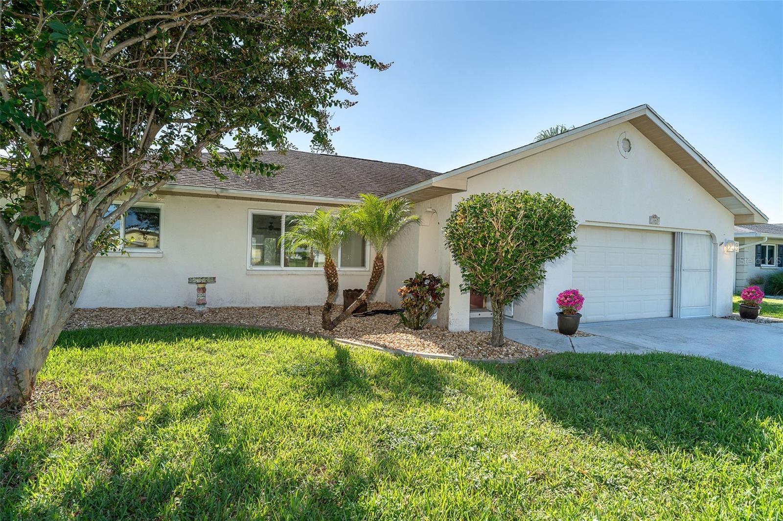 Welcome to the exceptional community of BAY VISTA BLVD, where residents enjoy privacy on oversized lots and immediate access to Lemon Bay Park. Kayakers, birdwatchers, hikers, fishing and pet enthusiasts love this 210-acre park. BAY VISTA BLVD is a DEED RESTRICTED COMMUNITY with modest $60 annual dues. Englewood Water District supplies PUBLIC WATER AND SEWER. FEMA classifies the community as FLOOD ZONE X, X500. Community rules and regulations are reasonable to protect and enhance homeowner’s properties. Step inside and you are greeted to a generous sized living room that leads to the impressive remodeled kitchen, family room, and dining room arrangement. The split bedroom floor plan provides privacy, features a large primary bedroom with large closet and remodeled bathroom. The guest bedroom on the opposite side of the house, features a walk-in closet, linen closet and remodeled bathroom. Tile flooring throughout home makes for easy cleaning and durability. You will love the generous sized screened lanai with beautiful “park like” backyard views. Start your day with a short five-minute walk to beautiful Lemon Bay Park. A ten-minute bike ride takes you to our recently renovated Historic Dearborn Street with quaint boutique shops, fine dining, live music at the permanent bandstand, farmers market on Thursday and beautiful Veterans Memorial Monument. Ten-minute drive to Manasota Beach and Englewood Beach. HOME COMES WITH A TWELVE-MONTH HOME WARRANTY. Excellent opportunity for the first time home buyer or second home for our northern neighbors.