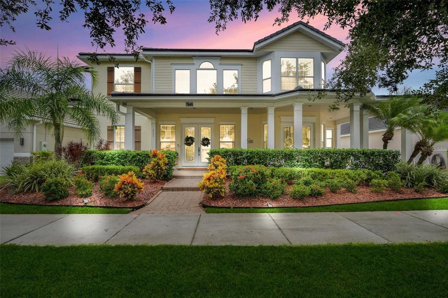 Welcome to 7545 Lake Albert Drive.  Where timeless architecture meets modern luxury. Nestled on an expansive lot in one of Windermere's most sought after communities, this stunning estate offers the perfect balance of privacy, comfort, and resort-style living just minutes from Walt Disney World and the best of Central Florida.

Arrive via a long, elegant driveway, framed by lush landscaping, leading to a spacious rear detached garage connected by a breezeway. This meticulously maintained estate features a NEW ROOF, ensuring both peace of mind and long-term value.

Step inside and be greeted by an oversized foyer and soaring ceilings, filling the home with natural light throughout. A wooden staircase with wrought iron accents adds a touch of elegance, while the open layout seamlessly connects living, dining, and entertaining spaces.

The gourmet gas kitchen is a chef's dream, featuring granite countertops, custom solid wood cabinetry with crown molding, a center island, and upgraded finishes. A convenient powder room on the main level ensures effortless entertaining.

The primary suite, located on the first floor, is a private retreat with direct pool access. The spa-like primary bath includes a walk-in shower, soaking tub, and dual vanities.

Upstairs, you'll find three additional bedrooms and two full bathrooms including a private en suite, plus a catwalk overlooking both living spaces below.

Outdoor living is a true highlight with multiple covered spaces, including a front porch and screened in pool. The poolside exterior bathroom adds convenience for seamless indoor-outdoor living. The summer kitchen is perfect for entertaining with a built-in gas grill, sink, refrigerator, and storage, plus a breezeway patio and fire pit area. Permanent Govee lighting sets the mood for unforgettable evenings spent under the stars.

The community features Lake Burden pier for fishing, beautifully maintained parks, playground, and tennis courts for active living and recreation.

This home delivers the full Florida lifestyle whether you're hosting poolside gatherings, unwinding in the private backyard, enjoying community amenities at Lake Burden and the tennis courts, exploring Windermere's lakes and boutique shops, or experiencing world-class attractions like Walt Disney World just minutes away.