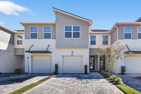 Photo of 25993 Woven Wicker Bend, Lutz, FL 33559 (MLS # TB8449774)