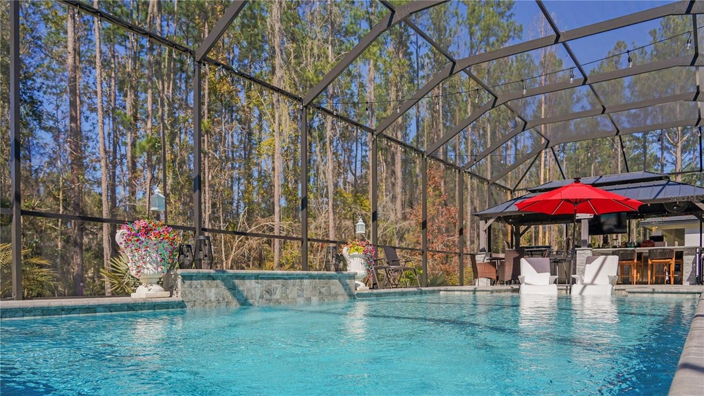 Photo of 4801 Majestic Hills Loop, Brooksville, FL 34601 (MLS # TB8472502)