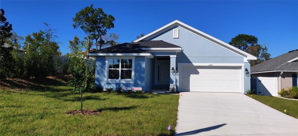 Photo of 13175 Gulf Bay Lane, Spring Hill, FL 34609 (MLS # OM707748)