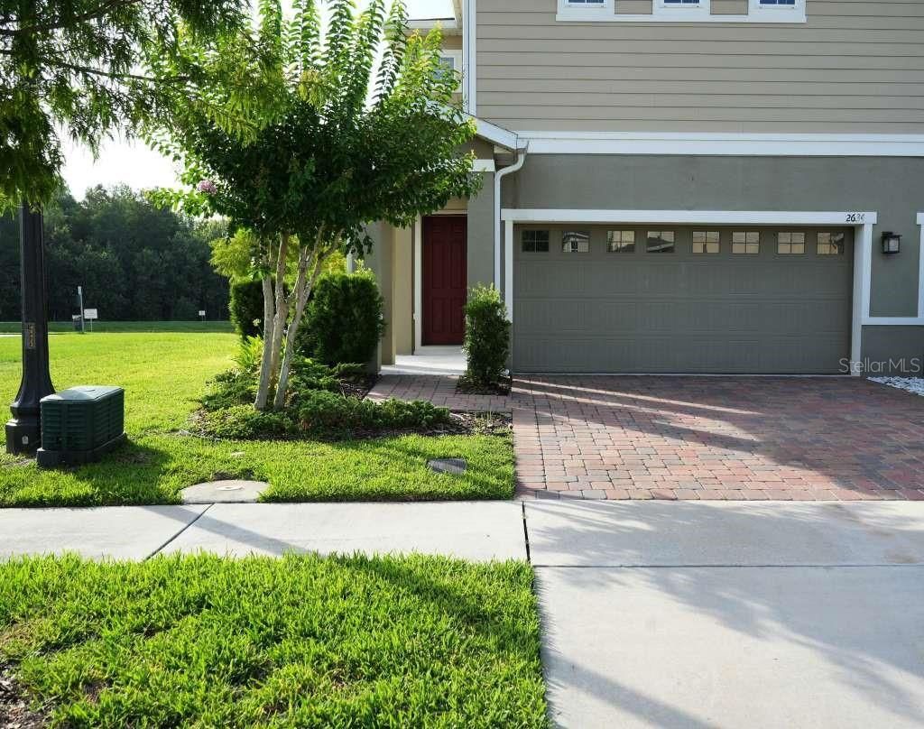 Photo of 2634 Pleasant Cypress Circle, Kissimmee, FL 34741 (MLS # O6412428)