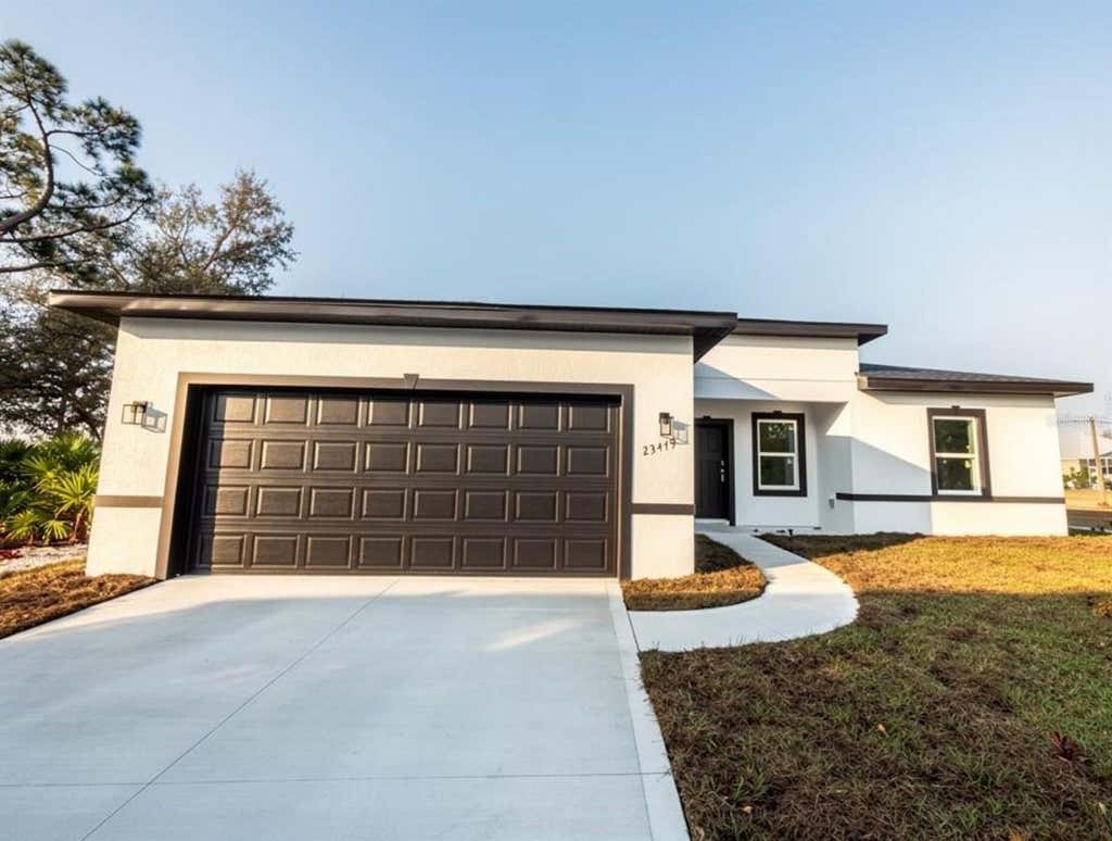Photo of 23419 Gemstone Avenue, Port Charlotte, FL 33980 (MLS # O6434660)