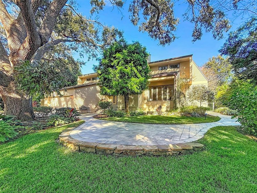 Experience modern contemporary living at its finest in this one-of-a-kind luxury executive estate nestled within the highly sought-after Autumn Woods community of Palm Harbor. Set on nearly half an acre, this 4-bedroom, 3.5-bath pool home offers exceptional privacy, refined design, and resort-style outdoor living surrounded by mature landscaping and fruit trees—your own secluded “secret garden.”Designed for both elegant entertaining and everyday comfort, the home features expansive open living spaces that seamlessly connect the family room, dining area, and chef’s dream kitchen. The kitchen is impeccably appointed with Miele built-in ovens, a Wolf cooktop, Sub-Zero refrigeration, including drawer refrigeration, custom wood cabinetry, and marble countertops—a true culinary showpiece.An en-suite bedroom on the first floor overlooks the pool and garden, offering flexibility for guests or multigenerational living. Upstairs, you’ll find three additional bedrooms, including the stunning primary suite, thoughtfully positioned for privacy.Walls of Marvin double-insulated windows and expansive patio doors flood the home with natural light while inviting the outdoors in. Step outside to the saltwater swimming pool and extensive patio areas, ideal for entertaining or quiet relaxation at any time of day. Additional high-end features include: Solid core wood doors throughout, a Contemporary fireplace, two-car garage & fully fenced yard. Autumn Woods is a distinctive upscale community known for its custom homes, rolling landscape, mature trees, and tranquil setting. Residents enjoy access to four lakes, tennis courts, a basketball court, and a private park, all just minutes from award-winning beaches, shopping, dining, and entertainment. Zoned for A-rated schools, including Palm Harbor University High School. Included in monthly rent: Pest control, lawn care/landscaping, pool service, and security system. This is a rare opportunity to lease a truly exceptional home in one of Palm Harbor’s most coveted neighborhoods.