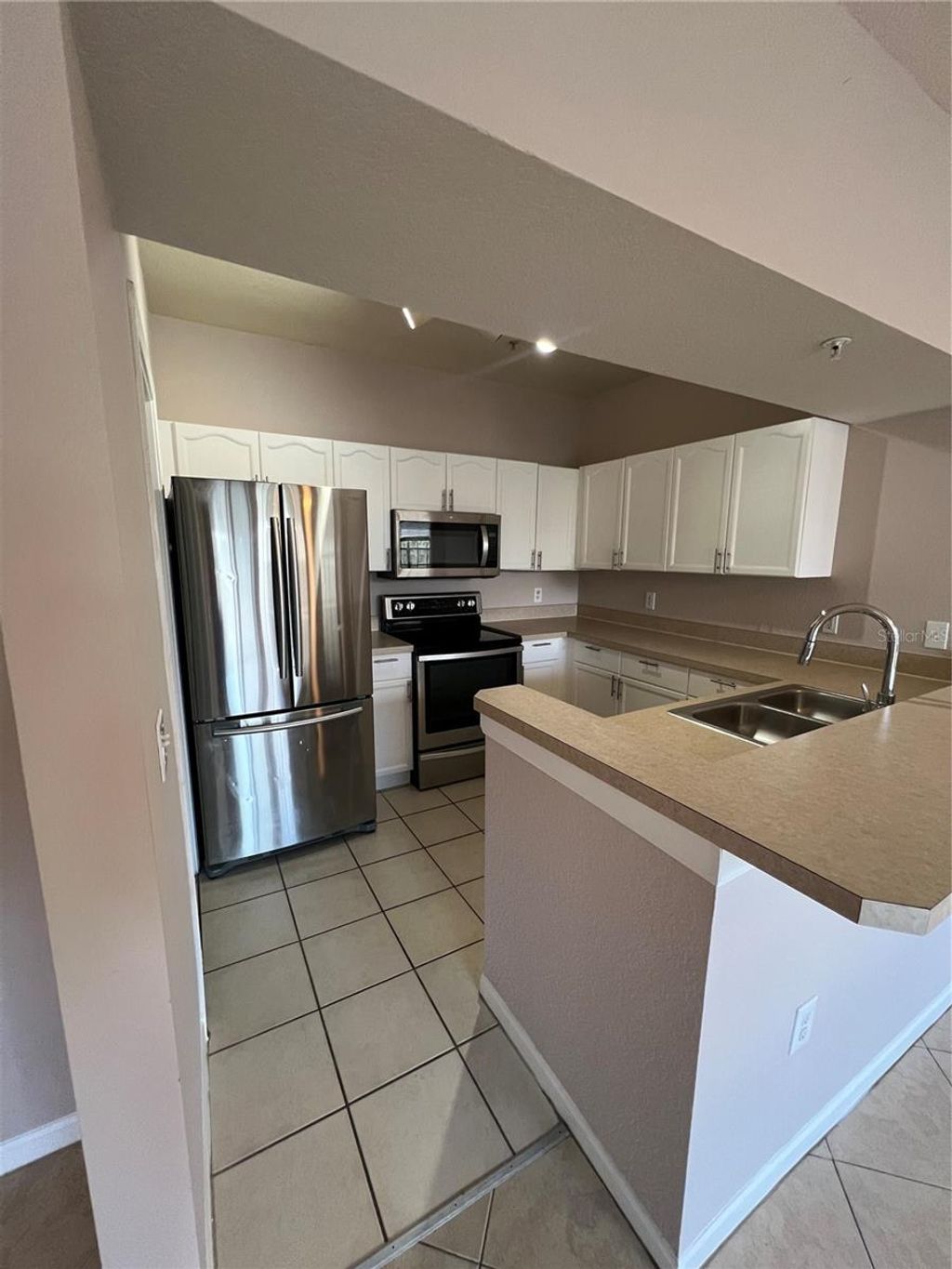 Photo of 5125 Palm Springs Boulevard #13203, Tampa, FL 33647 (MLS # O6359549)