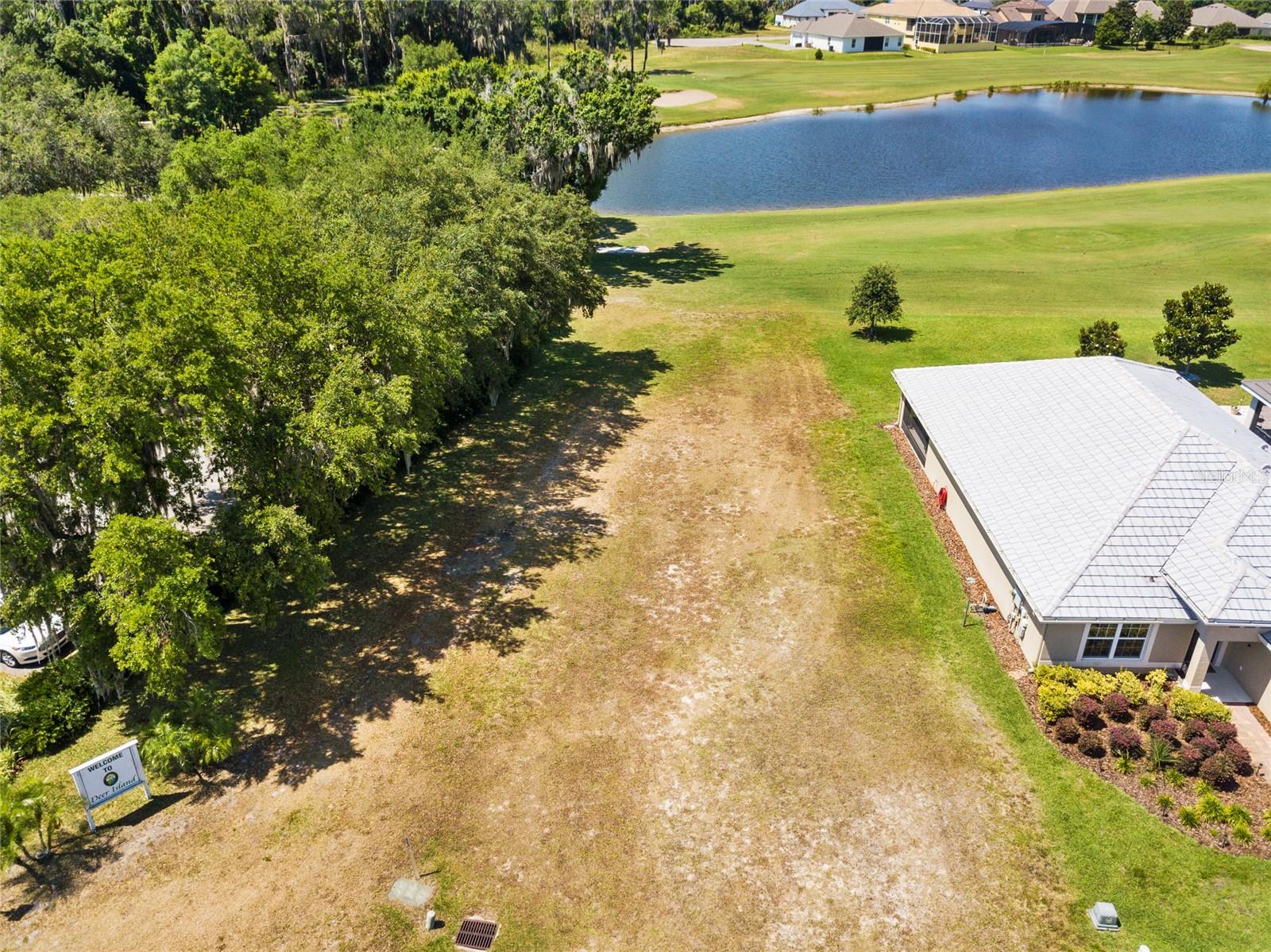 Nestled in the heart of Deer Island, this lot presents an unparalleled opportunity for those with a taste for luxury and a love for nature. As the closest property to the Eagles Way Clubhouse, it offers an exclusive lifestyle that few can match.
Deer Island is not just any island—it’s a sanctuary of serenity, cradled between the tranquil waters of Lake Dora and Lake Beauclaire, both esteemed members of the Harris Chain of Lakes. This is more than a location—it’s your personal slice of paradise.
Imagine the possibilities as you envision your dream home taking shape on this prime lot. With the 18-hole championship golf course, ranked an impressive 24th on the 2023 Golfer’s Choice list, right at your doorstep, you can indulge in the sport at your leisure. As a homeowner in Deer Island, the club is yours to join, offering memberships for those seeking that extra touch of luxury.
The location is a gateway to adventure and entertainment. A short drive takes you to Tavares, the renowned Seaplane Capital of the World, boasting a Splash Park and hosting over 16 major community events annually. The historic Downtown Mount Dora offers a plethora of exquisite dining options, unique shopping experiences, and captivating historical narratives.
Craving for world-class entertainment? The world-famous theme parks of Disney and Universal, as well as the vibrant community of The Villages, are just a 45-minute journey away, promising endless excitement.
This is more than a property—it’s the key to a lifestyle of elegance and class. Your dream home awaits on Deer Island. (Seller is licensed real estate agent SL#3546911)