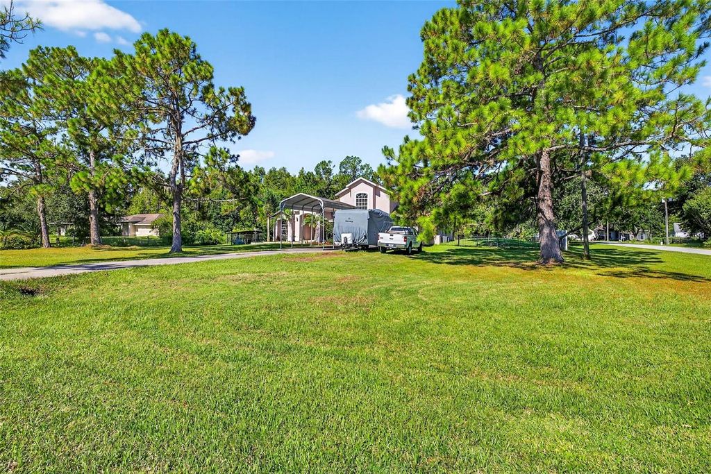 Photo of 7911 Pine Lands Drive, Wesley Chapel, FL 33544 (MLS # TB8424596)