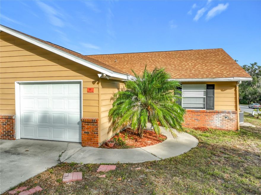 Nice 2BD/2BA corner-lot home with NO HOA, ideal as a primary residence or investment property. Open floor plan with laminate flooring. Kitchen features an eat-in breakfast bar and closet pantry. Primary bedroom features 2 built-in closets. Bathroom includes a tub/shower combo. Enjoy the 8x8 screened-back-porch, plus a 1-car garage. Beautiful patio with palm trees. Great location near parks, hospital, shopping, dining, major roadways and just 8 minutes from Leesburg international airport. Do not miss this opportunity, give us a call today!
