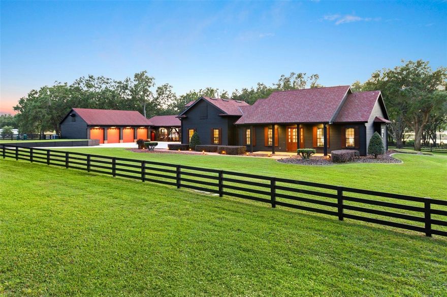 Encompassing five pristine acres, this exceptional compound offers a rare blend of privacy, craftsmanship, and refined outdoor living. Framed by mature oaks and approached by a picturesque, tree-lined drive, the property unfolds as a secluded retreat designed for casual entertaining and boundless enjoyment of serious hobbies and collections.  

At the heart is a 3,041-square-foot farmhouse rich in warmth and architectural character, offering 3 bedrooms, 2.5 bathrooms, a flex room, and a second-floor bonus space. Thoughtfully designed for function and lifestyle, the estate is further enhanced by a detached lake side retreat—featuring a 4-car garage with 13-foot doors, multiple vehicle lifts, epoxy floors, and an integrated compressor system. An air conditioned 2nd story storage area is accessed by elevator.  The commercial kitchen, comfortable gathering area, and private lounge create a truly unique environment for entertaining and displaying prized possessions.

Additional features include a 6-car pavilion and BBQ pergola with a stone fire pit.  Structures are versatile - offering endless possibilities for collectors, creatives, or future expansion. The sweeping setting captures serene lake and sunset views, while a whole-property generator and security system provide comfort and peace of mind.

With ample room to expand, the existing residence can serve as a guest home while a new primary estate is brought to life. Zoned for horses and ideally located just minutes from Hamlin Town Center, with convenient access to SR-429, Walt Disney World, and downtown Winter Garden, this is a rare opportunity to create a true legacy compound.  All TV's included.  Furnishings and other items may be available to purchase.  See attachments for Feature Sheet.