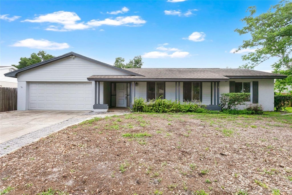 Photo of 8644 Sandberry Boulevard, Orlando, FL 32819 (MLS # O6422202)