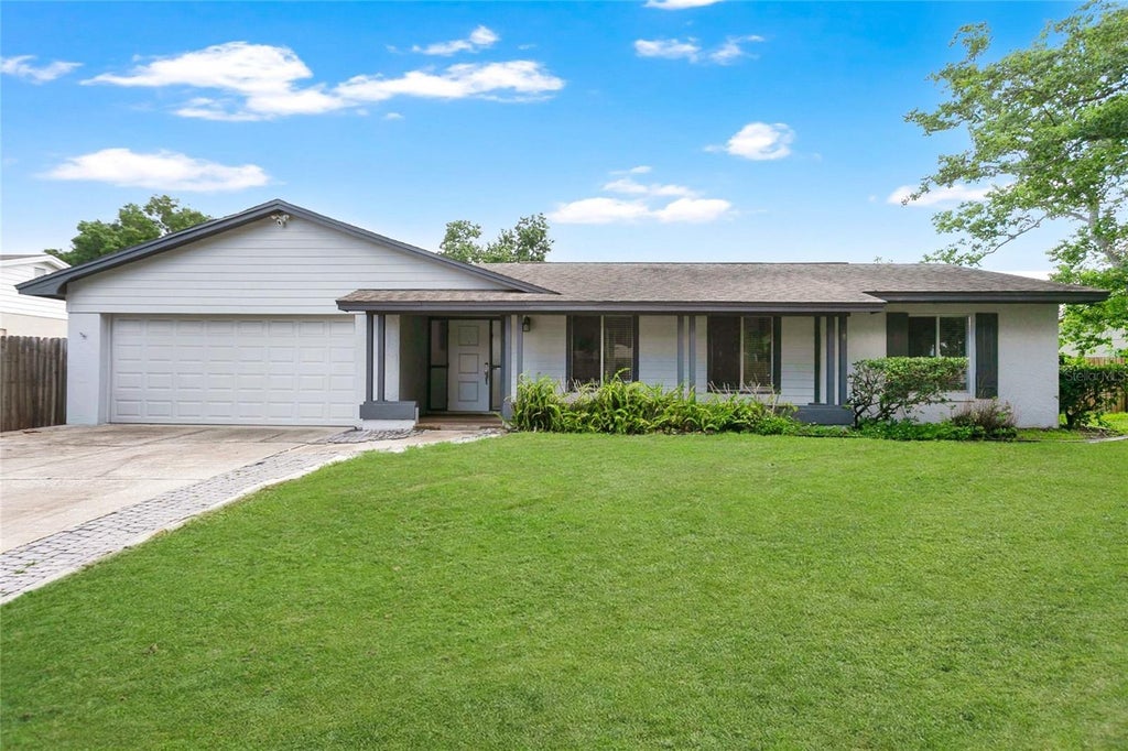 Photo of 8644 Sandberry Boulevard, Orlando, FL 32819 (MLS # O6422202)