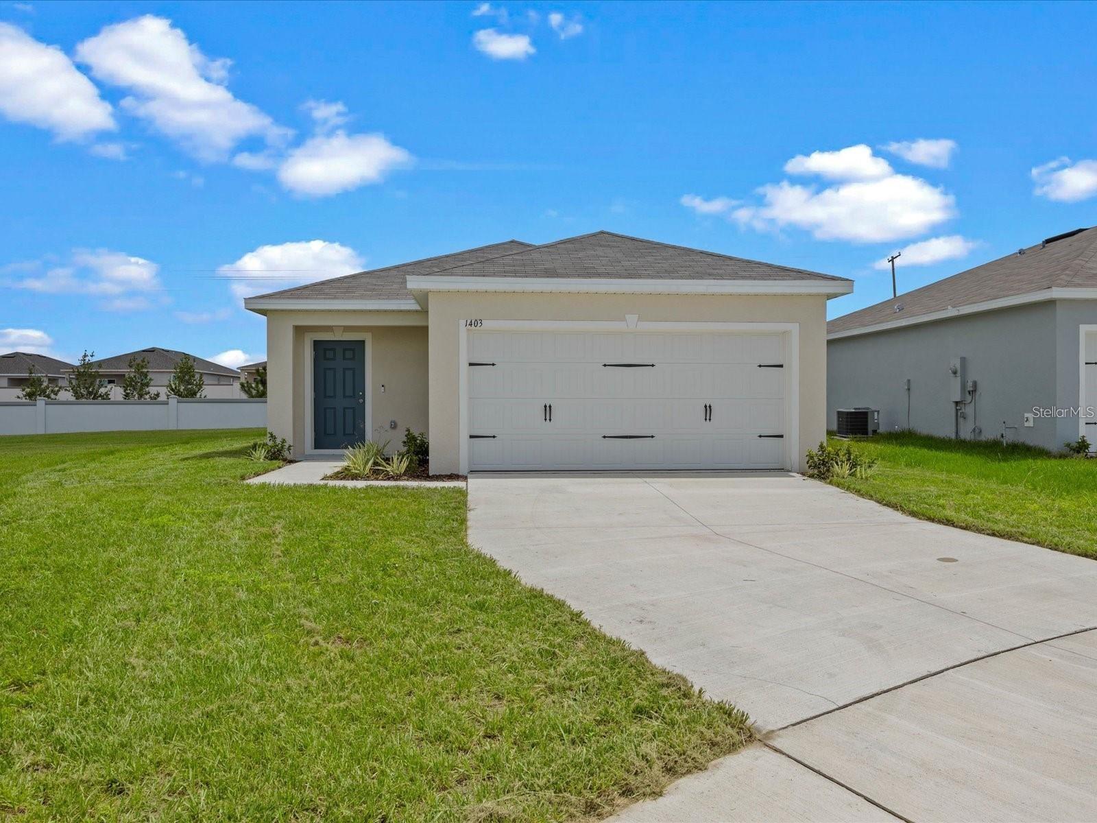 Welcome to your dream home! Built in 2023, this stunning 3-bedroom, 2-bath home is located in the heart of Haines City, right across from Haines City High School — and just 25 minutes from Orlando’s world-famous theme parks!
Step into a bright, modern layout featuring energy-efficient windows, sleek ceramic tile floors, and a spacious open-concept kitchen with upgraded wood cabinetry, abundant countertop space, and stainless steel appliances. The indoor laundry/utility room adds convenience to everyday living.
Unwind in your cozy living room with a glass of wine after a long day or entertain guests in a space that feels both fresh and welcoming.
Enjoy the benefits of low HOA fees and a community that puts you close to shopping, dining, top-rated schools, medical facilities, and major transportation routes.
BONUS: Seller is contributing up to $3,000 toward buyer’s closing costs!
Don’t miss this opportunity to own a brand-new home in a growing and desirable location.
Please text the listing agent before and after showing.
Your new home is waiting – schedule your tour today!